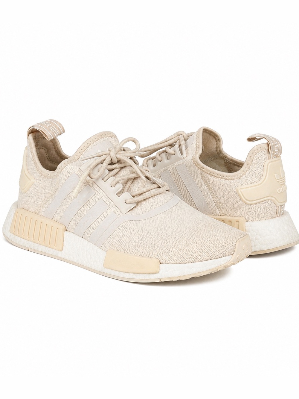 Adidas NMD_R1 sneakers in a light beige/cream colorway